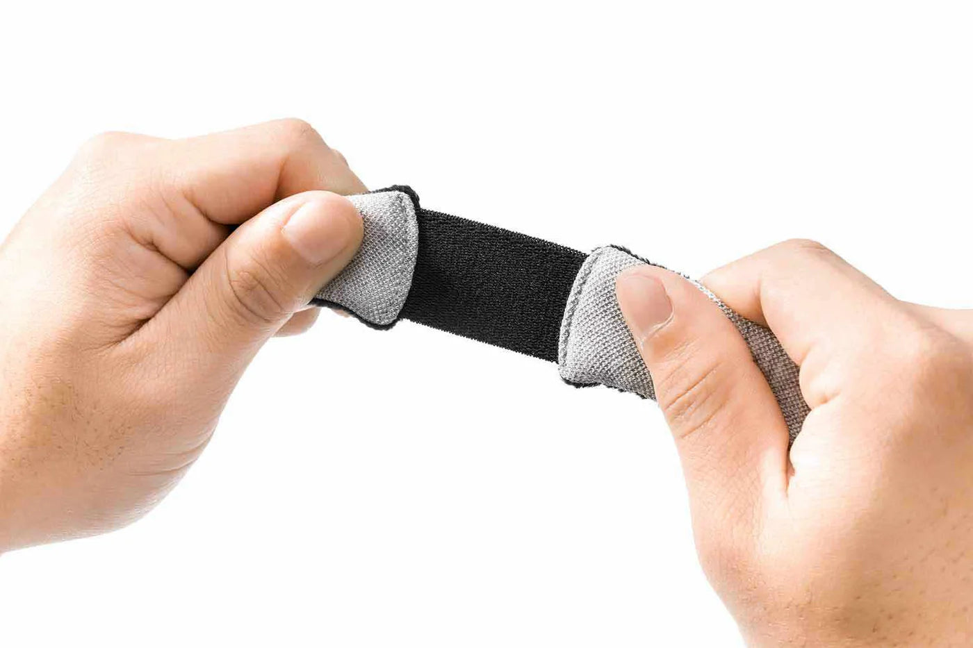 Manta sleep mask being stretched to show flexibility.