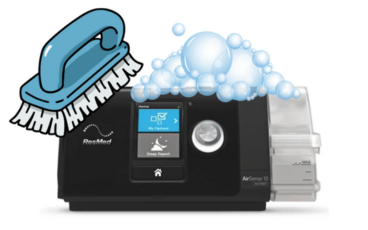 Image of a brush cleaning a AirSense 10 CPAP with soap. 