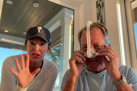 A husband and wife reviewing the New Noval Nasal CPAP mask by Fisher and Paykel. 