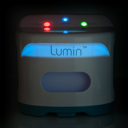 Lumin device with colorful lights on a dark background