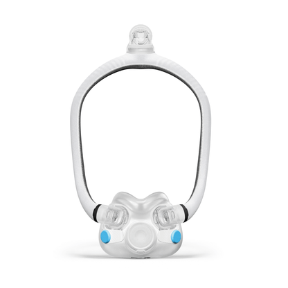 Front view of the AirTouch F30i Comfort mask system without headgear, displaying the open-face design and fabric-covered hollow frame.