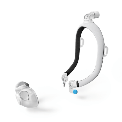 Exploded view of the AirTouch F30i Comfort system showing how the cushion detaches from the soft fabric frame and the quick-release elbow mechanism.