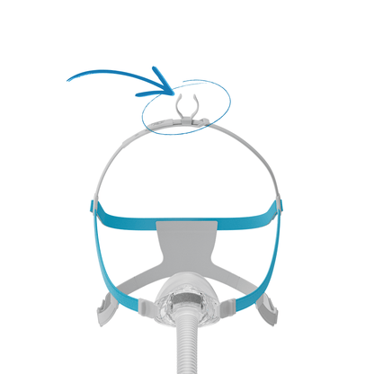 Front view of the Fisher & Paykel Nova Nasal Mask with a blue arrow highlighting the optional Tube Clip attached to the top of the headgear.