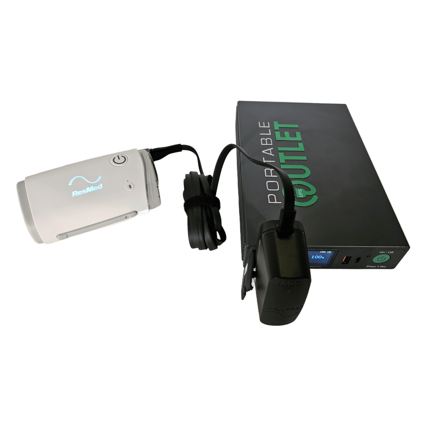 A ResMed AirMini travel CPAP machine powered by the Portable Outlet X9 battery, showing the standard power block plugged directly into the battery without needing extra adapters.