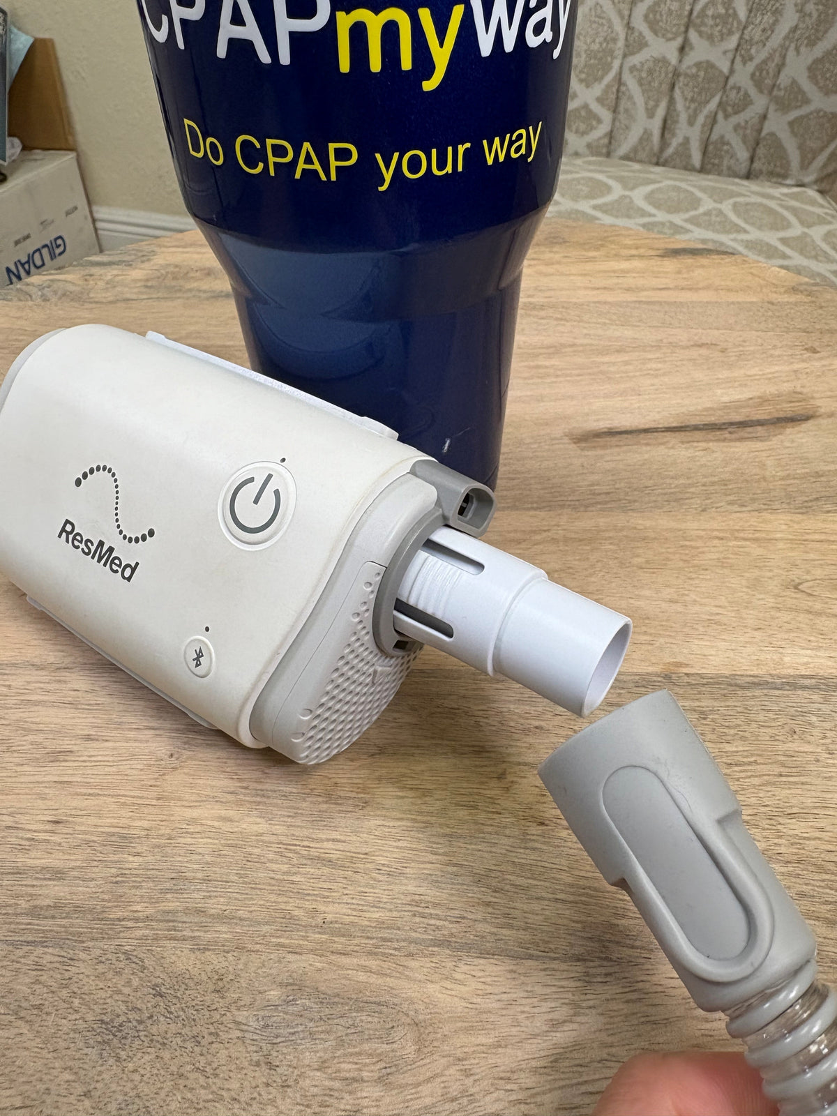AirMini hooking up to slim cpap tube via the AirMini Universal Tube Adapter. 