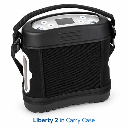 A black liberty 2 portable oxygen device in a black carry case with a shoulder strap, shown on a white background with the text 'Liberty 2 in Carry Case' below.