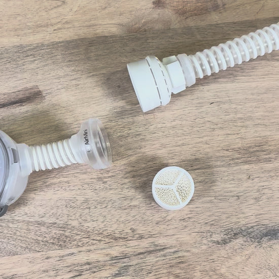 Removing the generic HME filter from the AirMini Mask kit. 