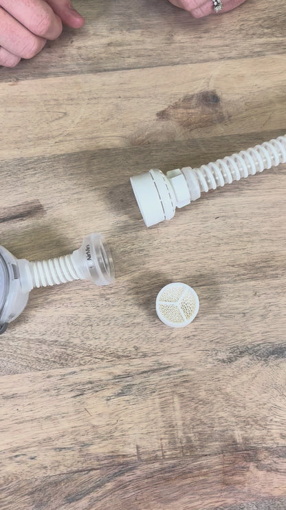 Removing the generic HME filter from the AirMini Mask kit. 