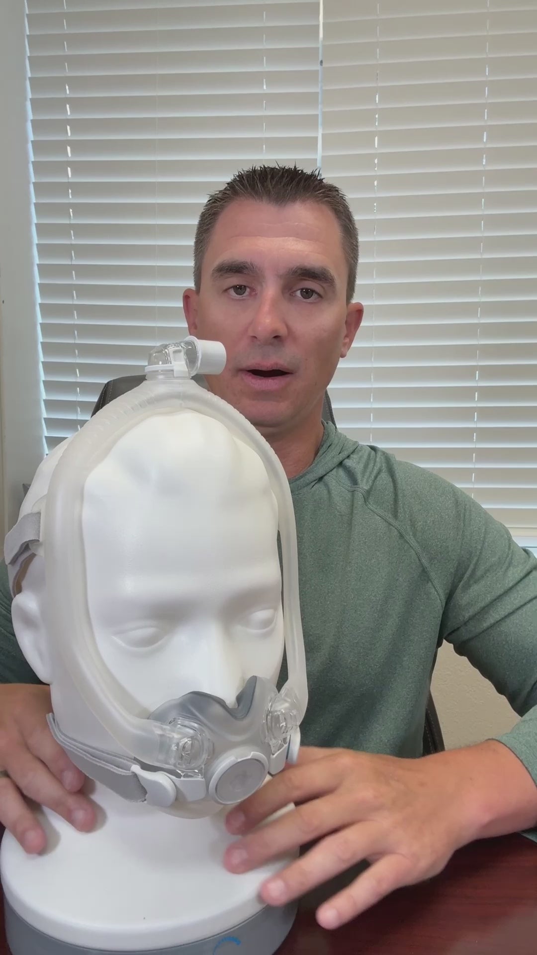 A demonstration of the AirTouch F30i mask components being assembled. Shown are the under-the-nose ComfiSoft cushion, the hollow "30i" frame for airflow, and the top-mounted swivel elbow. The video highlights the tool-free disassembly process for better mask hygiene.