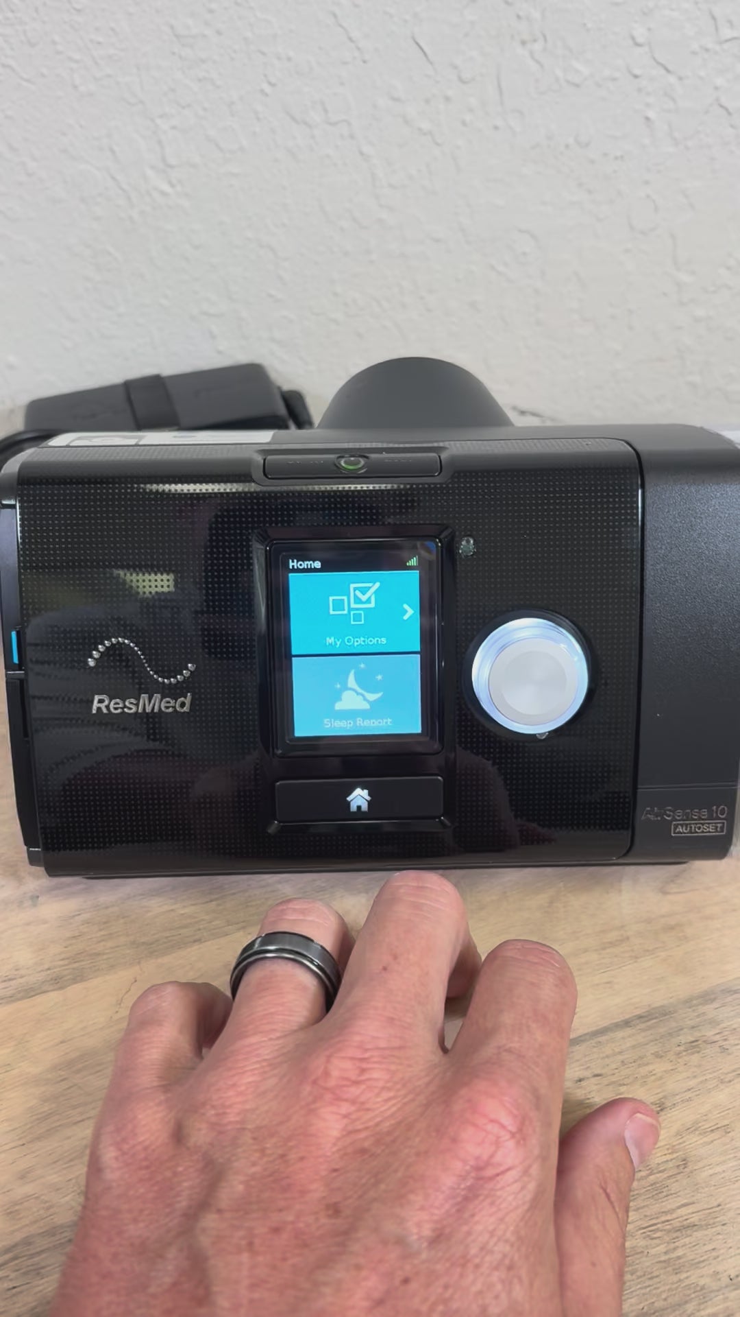 Changing the setting in the ResMed AirSense 10 CPAP for the installation of the inline bacteria filter. 